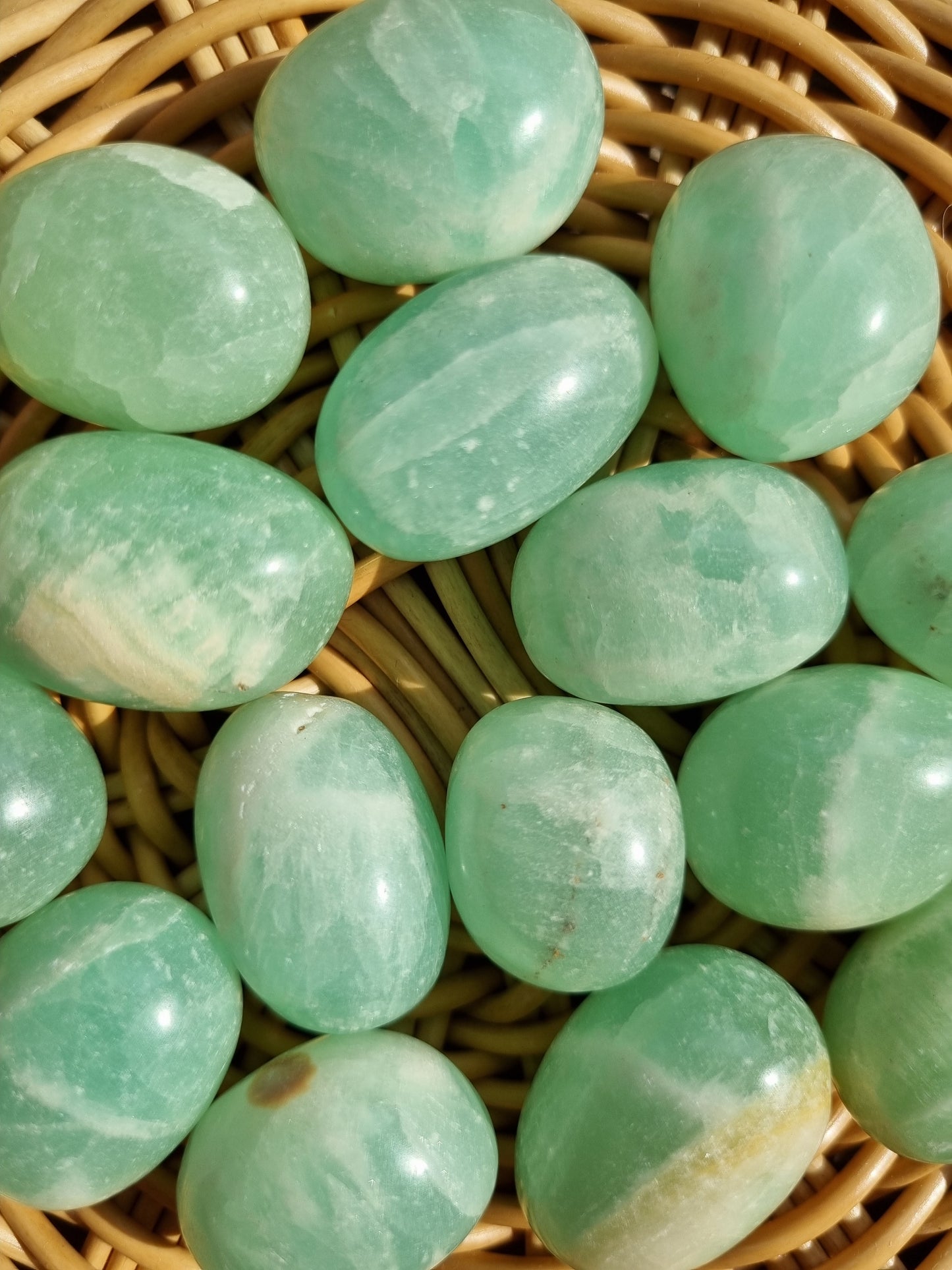 Pistachio calcite tumbles